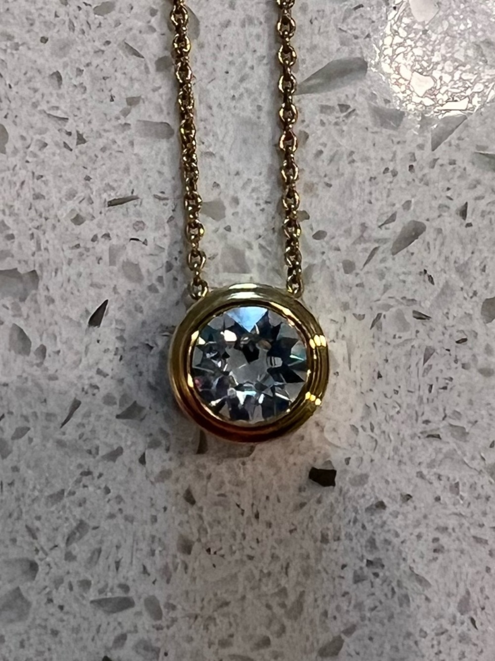 Touchstone Crystal Gold Necklace with Clear Crystal Pendant